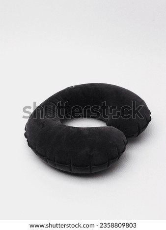 neck pillow on gray background Royalty-Free Stock Photo #2358809803