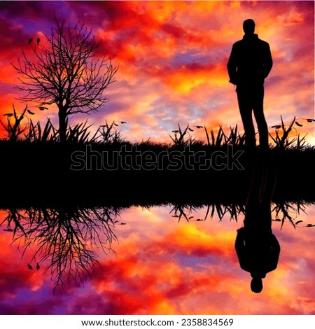  A shadow picture.A man standing near a tree in sunset infront of a river .we can see the reflection of it in the river .A cool relaxing pictures is this 