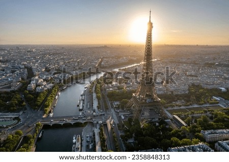 Beautiful sunrise in the city of Paris, France.Aerial view of the Eiffel tower and the Seine river.