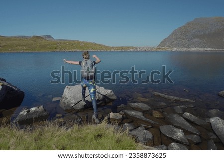 Jump into lake ,Llyn Bochlwyd  Royalty-Free Stock Photo #2358873625