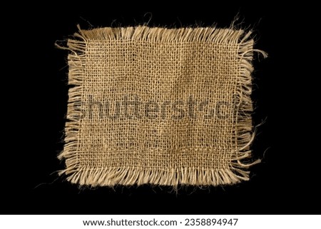 Piece of linen fabric isolated on a black background. Royalty-Free Stock Photo #2358894947