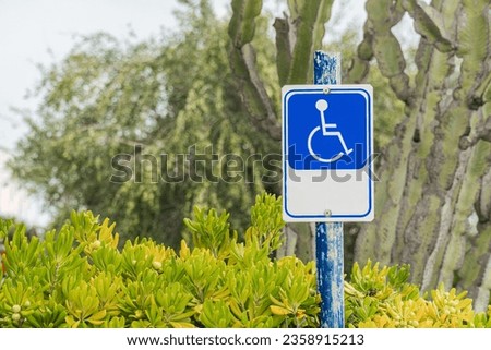 Parking sign reserved for the disabled.