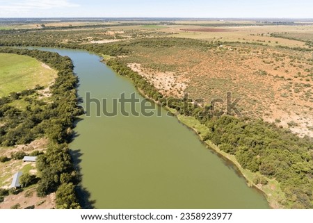 View of the Vaal river and riverine vegetation in the Northern Cape Province of South Africa 
 Royalty-Free Stock Photo #2358923977