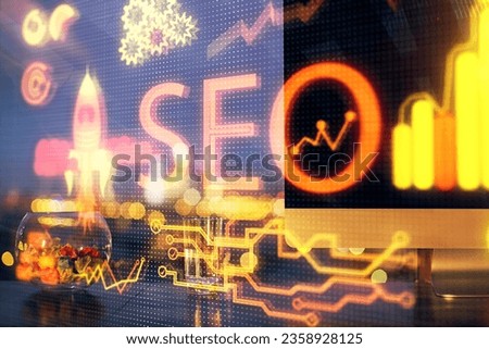 Double exposure of table with computer and seo drawing hologram. Search optimization concept.