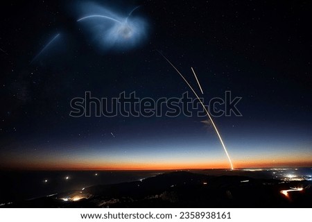 This is a time-lapse image of a rocket launch taking place at night Royalty-Free Stock Photo #2358938161