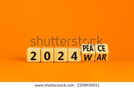 2024 war or peace symbol. Businessman turns a wooden cube and changes words 2024 War to 2024 Peace. Beautiful orange table orange background, copy space. Business 2024 war or peace concept.