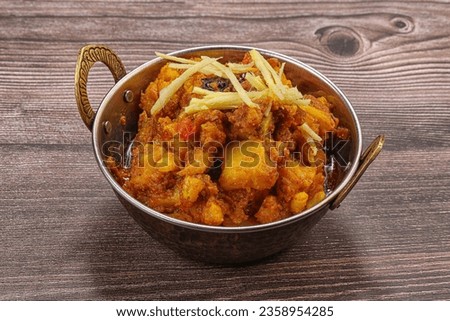 Indian cuisine - Aloo Goby curry with vegetables Royalty-Free Stock Photo #2358954285
