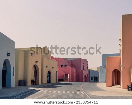 Doha, Qatar. The colorful Mina District at Old Doha Port in Qatar. Royalty-Free Stock Photo #2358954711