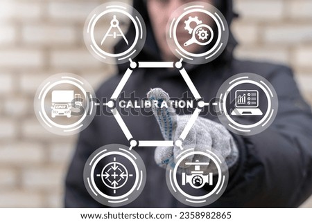 Worker using virtual touch screen clicks word: CALIBRATION. Concept of activate calibration, intermediate check or calibration measurement. Industrial calibration operations. Royalty-Free Stock Photo #2358982865