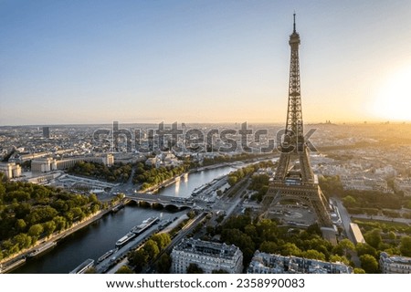 Aerial view streets of Paris, France, overlooking the famous eiffel tower of paris at sunset..