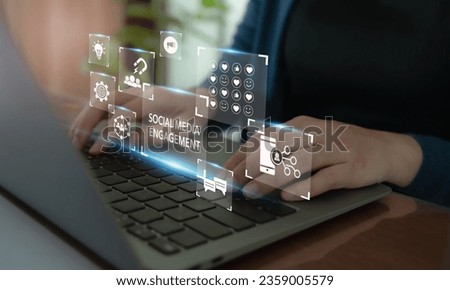 Social media engagement, Digital marketing concept. Working on computer for creating social media platforms to build relationships and drive sales. Engaging activities responding to comments, sharing  Royalty-Free Stock Photo #2359005579