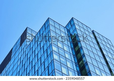 Modern office building. Architectural detail of modern building. Business concept of successful industrial architecture. Royalty-Free Stock Photo #2359048557