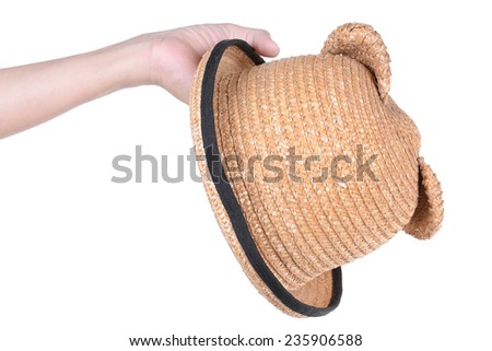 straw hat in hand isolated on white background