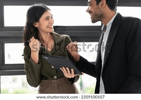 Success Asia businesswoman with Caucasian businessman at office	 Royalty-Free Stock Photo #2359100107