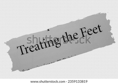 Treating the Feet - in English vocabulary language word with reference reflexology, health and body and mind well-being in black and white