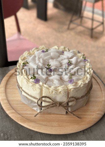 Fluffy and Moist Coconut Cake Homemade. a piece of coconut cake on dish. Homemade Coconut cream cake with coconut fruit.
Bakery picture free space for text.