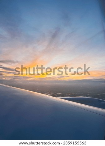 Beautiful Sky look scenery from Airplane window aesthetic picture on sky blue pink and orange pastel colourful cloud blend in pretty cute clouds