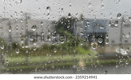 Close up of raindrop on window blur background