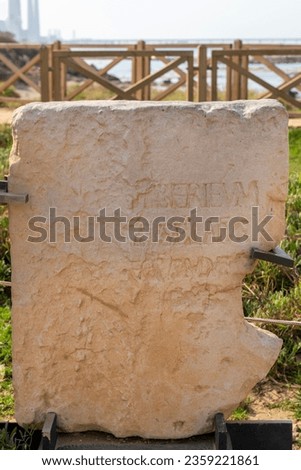 Dedication inscription written in Latin on stone at Caesarea that says "Pontius Pilatus, the prefect of Judea erected a building dedicated to the Emperor Tiberius".
 Royalty-Free Stock Photo #2359221861