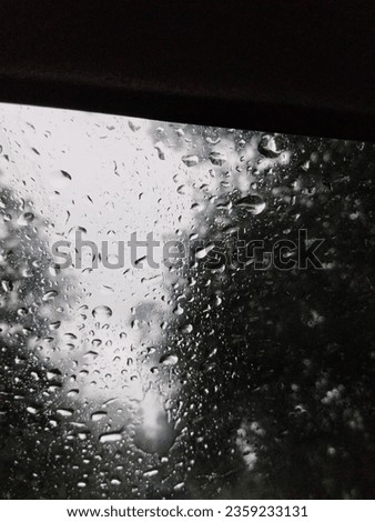 Rain drop on car glass stock photos