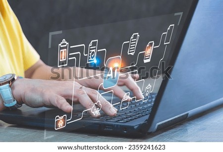 Female hands Using Document Management System (DMS) Virtual screen with Artificial Intelligence technology on Laptop computer to manage Data files efficiently, conveniently, quickly and securely.