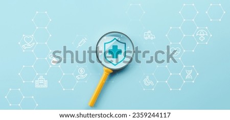 Health insurance concept, Health care checkup, Access to welfare health, Wellness and medical, Magnifying glass and healthcare insurance icon on pastel blue background, World health day Royalty-Free Stock Photo #2359244117