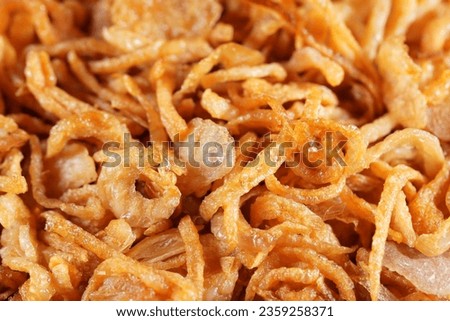 Crunchy fried onions, the perfect savory topping to enhance your dishes. #DeliciousCrunch #FoodieFave