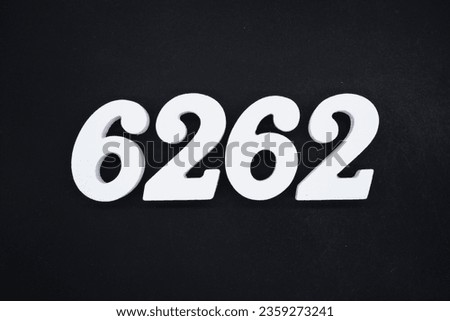 Black for the background. The number 6262 is made of white painted wood.