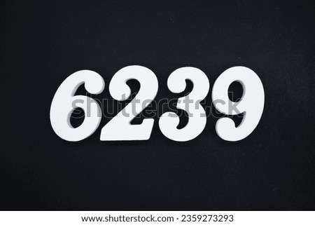 Black for the background. The number 6239 is made of white painted wood.