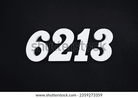 Black for the background. The number 6213 is made of white painted wood.
