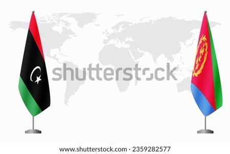 Libya and Eritrea flags for official meeting against background of world map.