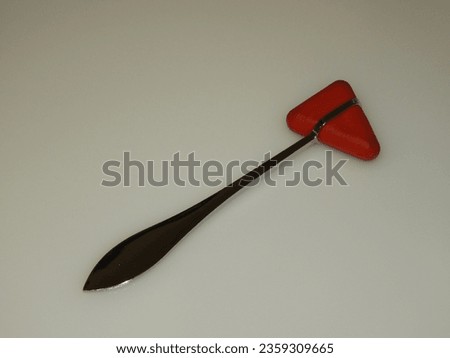 Red rubber reflex hammer physiotherapy chiropractic medical doctor Royalty-Free Stock Photo #2359309665