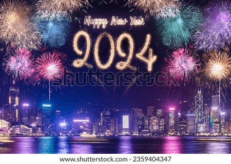 Happy new year 2024 firework over cityscape building near sea at night time celebration Royalty-Free Stock Photo #2359404347