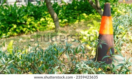 Traffic cones on road, road sign