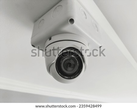 Install CCTV cameras on the ceiling inside the building. Royalty-Free Stock Photo #2359428499