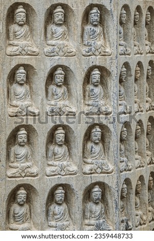 Buddha Statues carved in stone located in Seven Star Park, Guilin China, East Asia