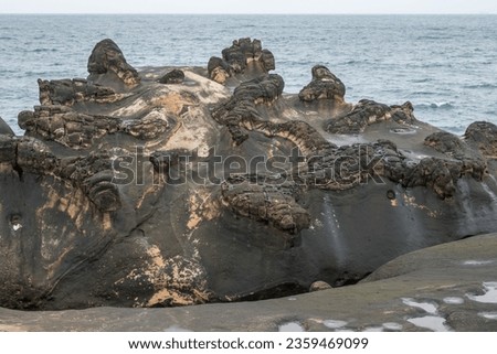 Ginger Rock formations in Yehliu Geopark, Taipei, Taiwan. Royalty-Free Stock Photo #2359469099