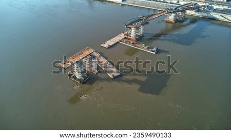 Aerial drone view of new pedestrian bridge under construction from above Royalty-Free Stock Photo #2359490133