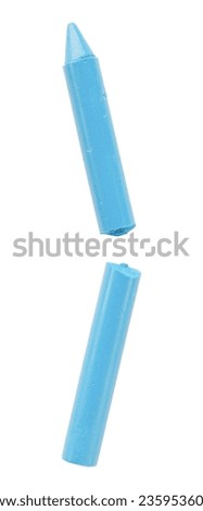 Light blue crayons isolated on white background, broken colored sticks