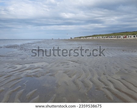 Spiekeroog is one of the East Frisian Islands, off the North Sea coast of Germany. Royalty-Free Stock Photo #2359538675