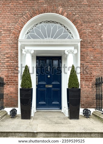 A famous blue painted Georgian door in Dublin, Ireland Royalty-Free Stock Photo #2359539525