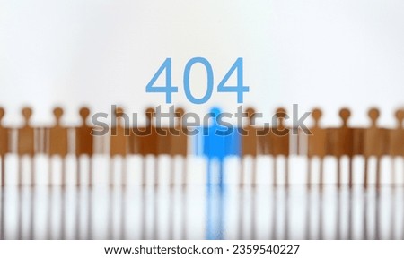 Photography of little human figures and text on monitor saying 404 search engine error concept