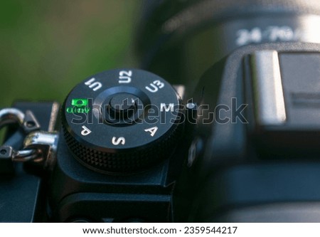 Mode dial on a digital camera. Camera mode dial with manual mode selected