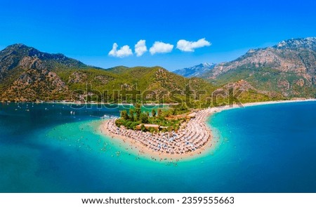 Blue Lagoon and Oludeniz beach aerial panoramic view. Oludeniz is a beach resort in the Fethiye district of Mugla Province, Turkey. Royalty-Free Stock Photo #2359555663