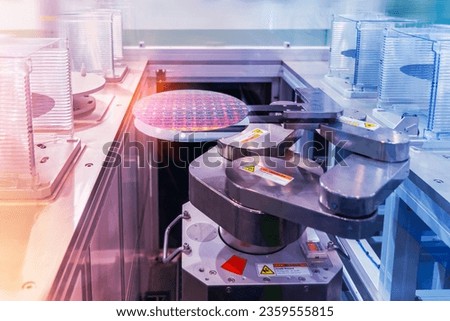 silicon wafers and microcircuits with automation system control application on automate robot arm Royalty-Free Stock Photo #2359555815