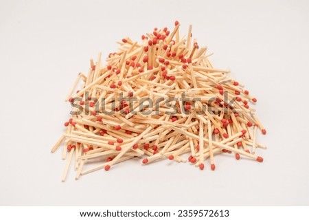 New matchsticks isolated on a background. Top view.  Royalty-Free Stock Photo #2359572613