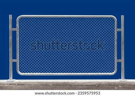 Chain link fencing isolated on blue background. Royalty-Free Stock Photo #2359575953