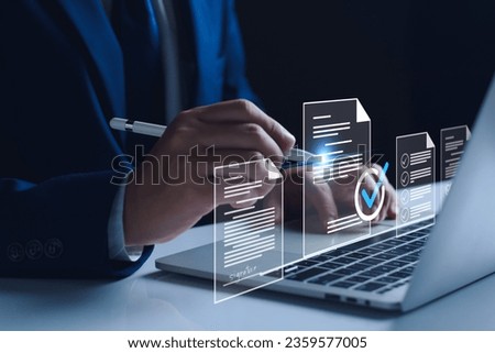 Manager is verifying the validity, security, approving requests, quality assurance, investment contracts. Online digital document work, paperless office. online survey. Checking mark up on check boxes Royalty-Free Stock Photo #2359577005