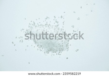 red ants feeding and carry sugar to nest on white background 