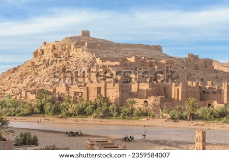 View on Kasba Aït Benhaddou from across the river Asif Ounila, in Morocco. Royalty-Free Stock Photo #2359584007